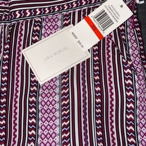 Print boho chic style bottom bell pants.